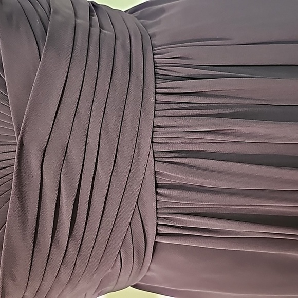 Purple strapless gown size 2. Sheer overlay. Fitted at the bust. DAVIDS… - Picture 4 of 13